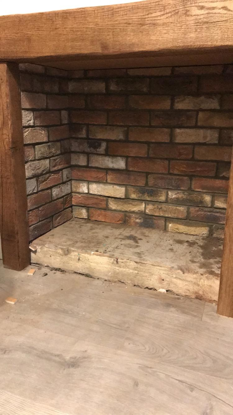Fireplace brickwork before restoration